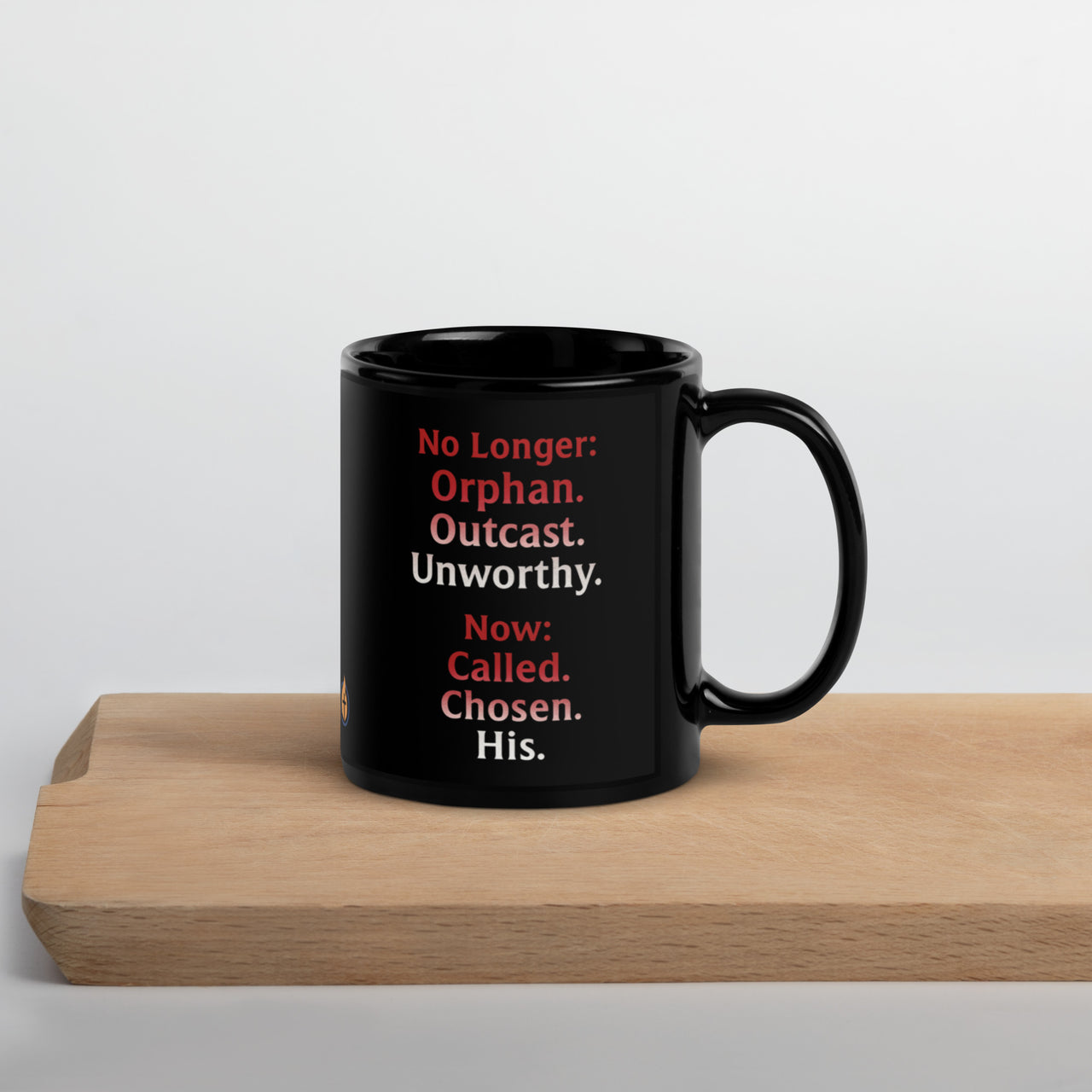 Renamed Black Glossy Mug 11oz reverse side with red fade to white word stack: “No longer: Orphan. Outcast. Unworthy. Now: Chosen. Called. His.”