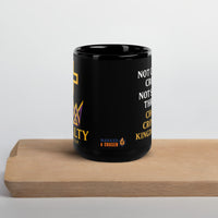15oz black Royalty Christian mug – bottom center features Marked & Chosen logo on shelf view