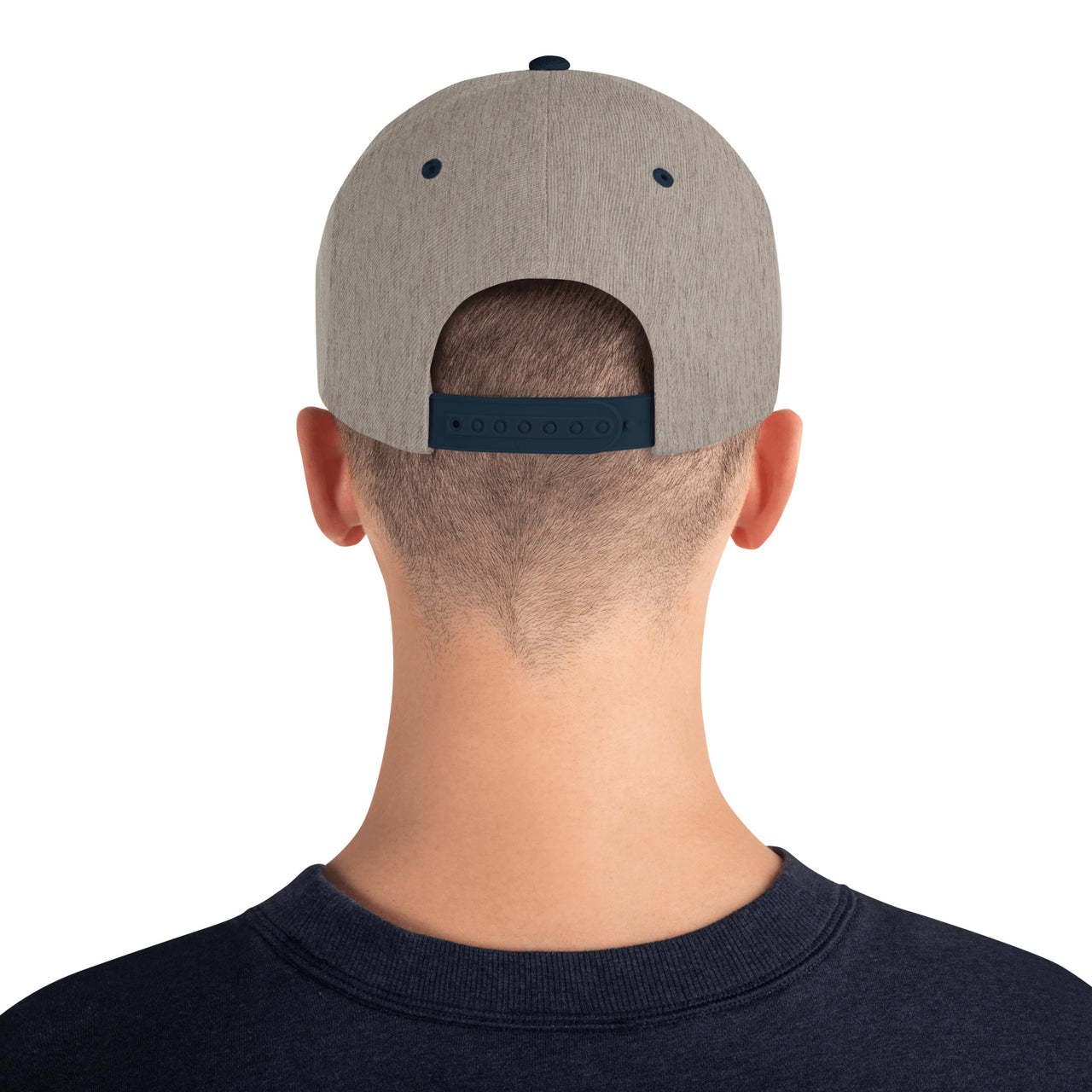 Male Model wearing Heather Grey/Navy Snapback showcasing the back Snap Enclosure.