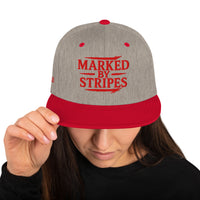 Woman wearing heather grey and red gospel snapback – front view with bold Christian embroidery