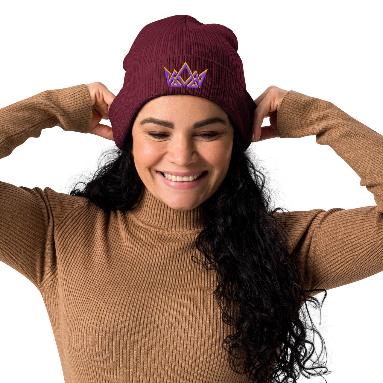 Woman wearing burgundy Royalty beanie – cuffed fit with purple and gold embroidered crown