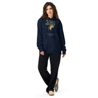 Female model wearing My Breath Bears His Name Hoodie in Navy, front glowing breath silhouette design
