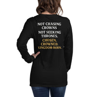 Female model in black gospel long sleeve shirt – back reads “Not Chasing Crowns. Not Seeking Thrones. Chosen. Crowned. Kingdom-Born.”