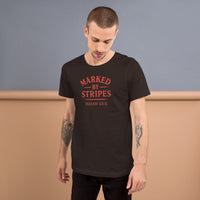 Man wearing brown Marked by Stripes t-shirt – red gospel logo on front