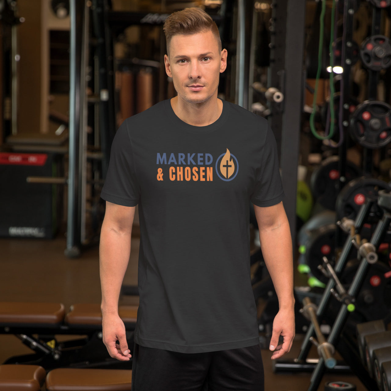 Man wearing dark gray gospel t-shirt – clean Christian logo front