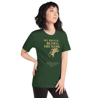 Female model wearing My Breath Bears His Name T-Shirt in Forest, front glowing breath design