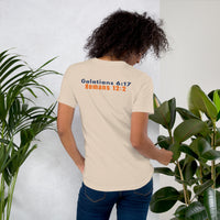 Female model wearing cream Christian shirt – scripture design shown on back