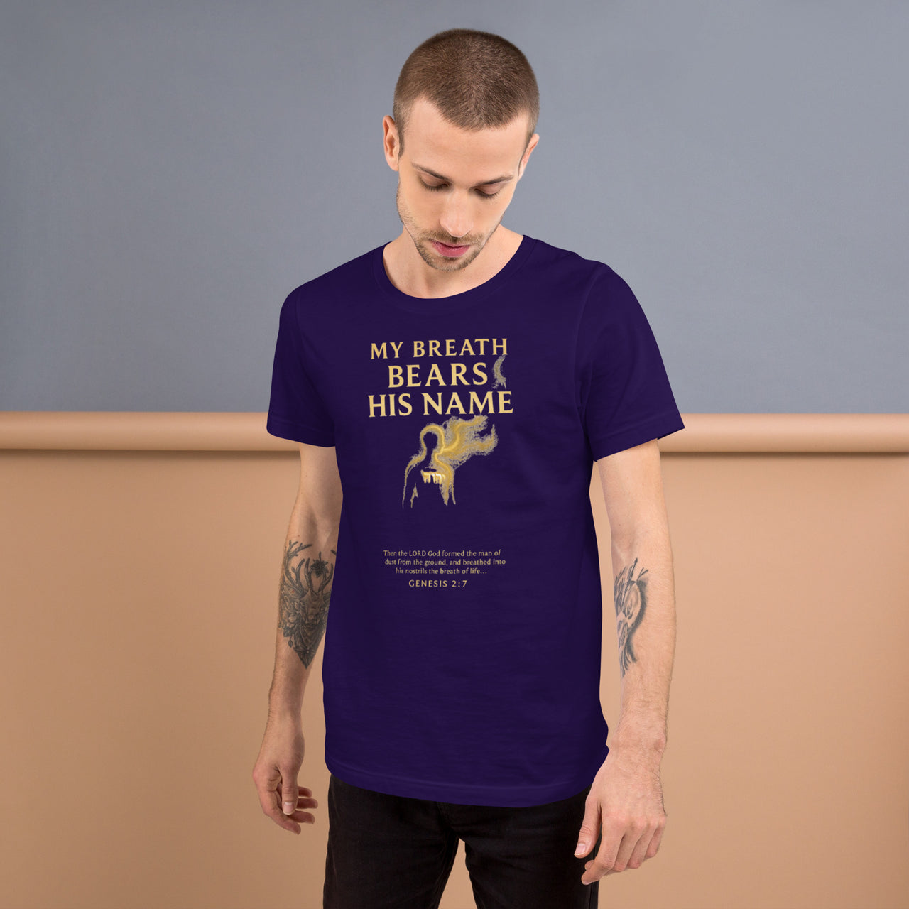 Male model wearing My Breath Bears His Name T-Shirt in Team Purple, front glowing breath design