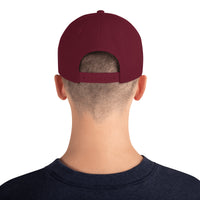 Man in Maroon Royalty snapback hat – plastic snapback closure and clean back panel