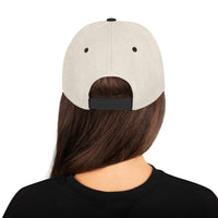 Woman in Natural/black snapback hat – mesh-style back with adjustable snap closure