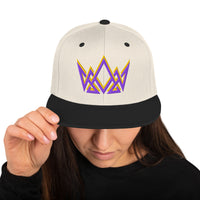 Woman wearing natural and black Christian snapback – purple and gold embroidered crown on flat bill cap