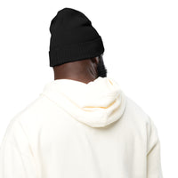 Man wearing black Christian beanie – Turned around showing the back of the beanie