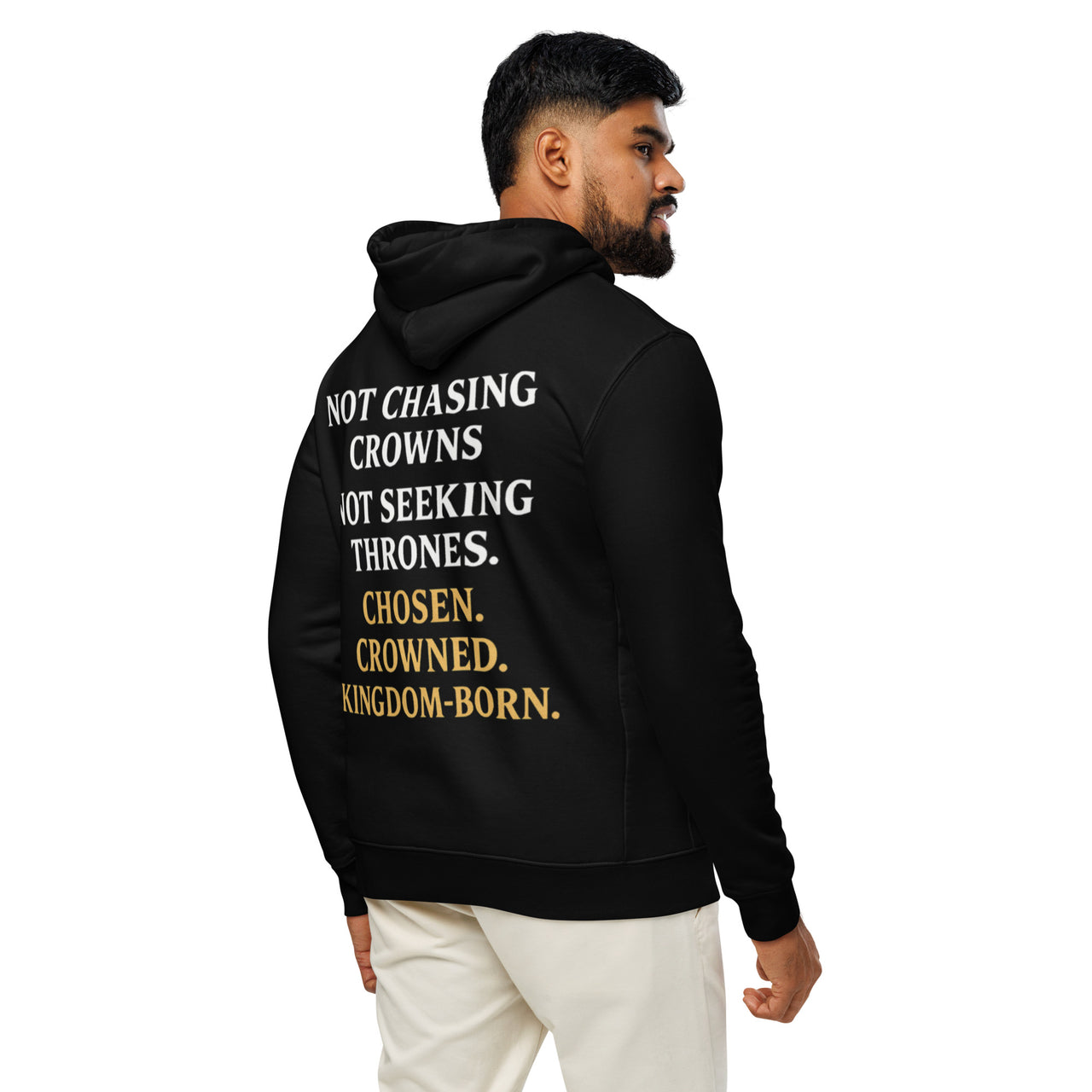 Male model in black Christian hoodie – back text reads “Not Chasing Crowns. Not Seeking Thrones. Chosen. Crowned. Kingdom-Born.” in white and gold