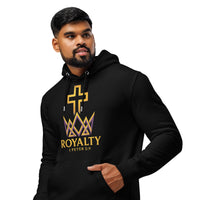 Man standing to the side wearing black Royalty hoodie – gold cross and crown front graphic with 1 Peter 2:9 reference