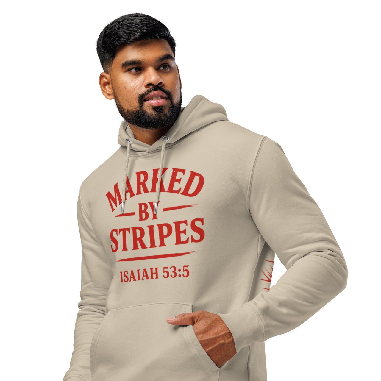 Side close-up of man wearing desert dust Christian hoodie – red Marked by Stripes logo visible