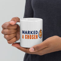 Model holding 11oz Marked & Chosen white mug – Christian logo side facing forward