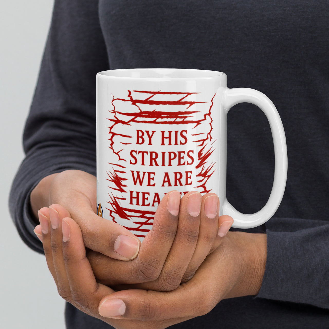 Model showing 15oz Christian mug – red Isaiah 53:5 verse front and center