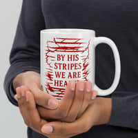 Model showing 15oz Christian mug – red Isaiah 53:5 verse front and center