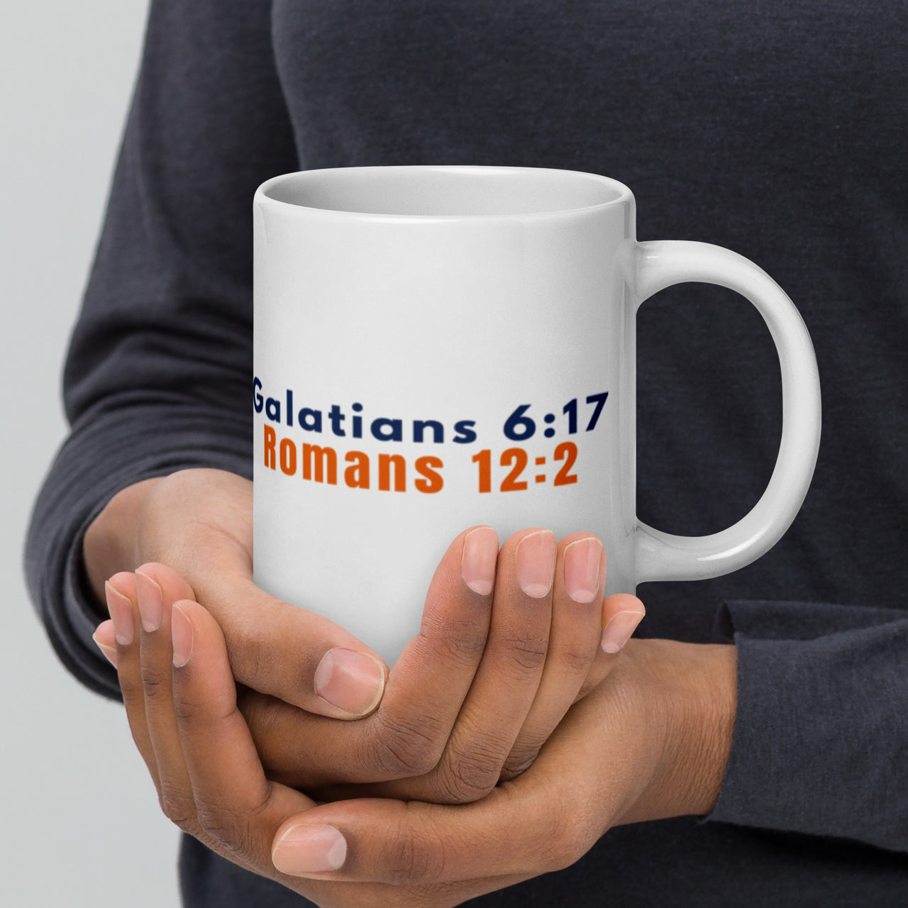 Model with 20oz Christian mug – scripture side visible with bold biblical verses